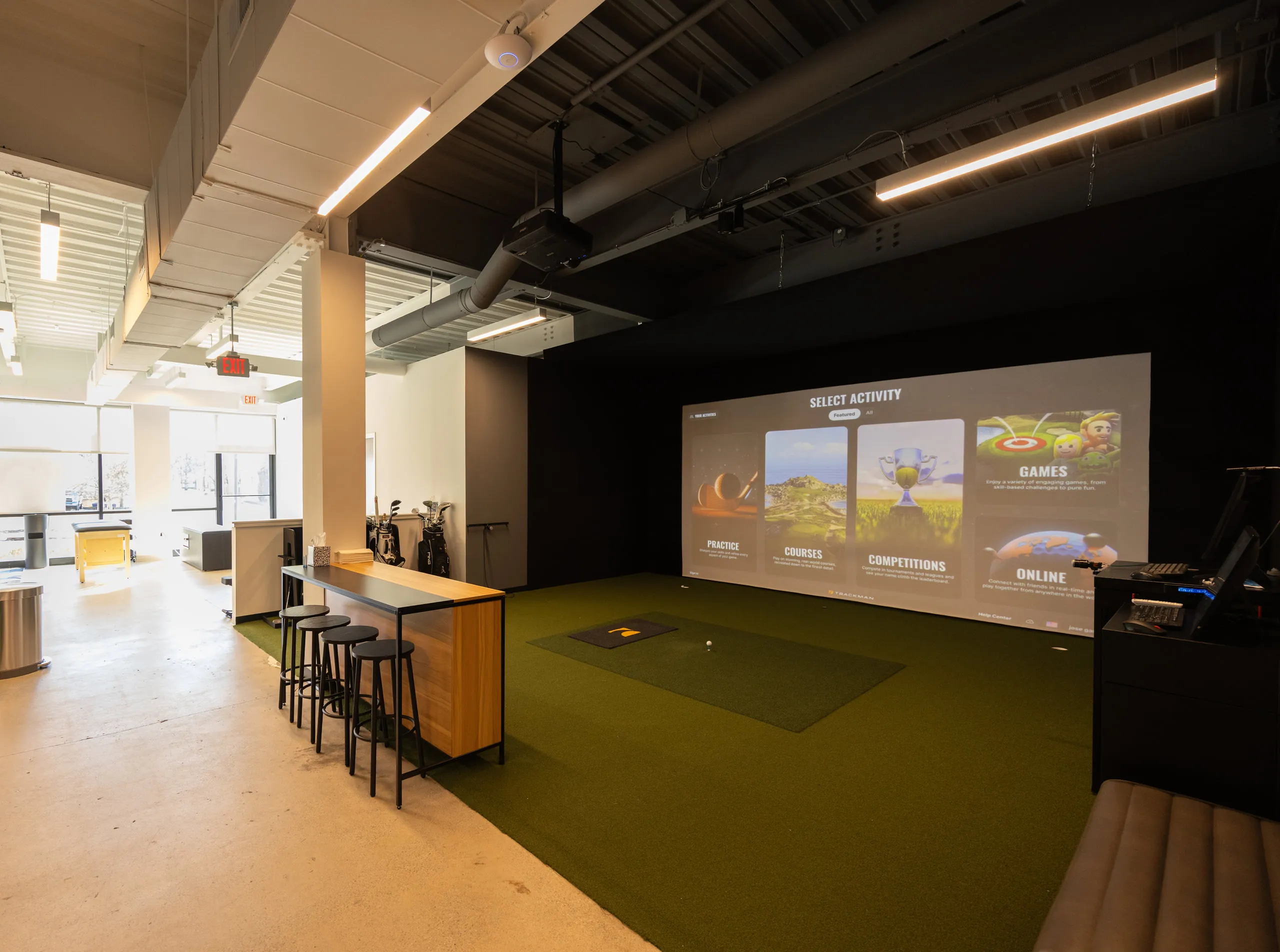 The simulator bay and lounge seating at All Square.