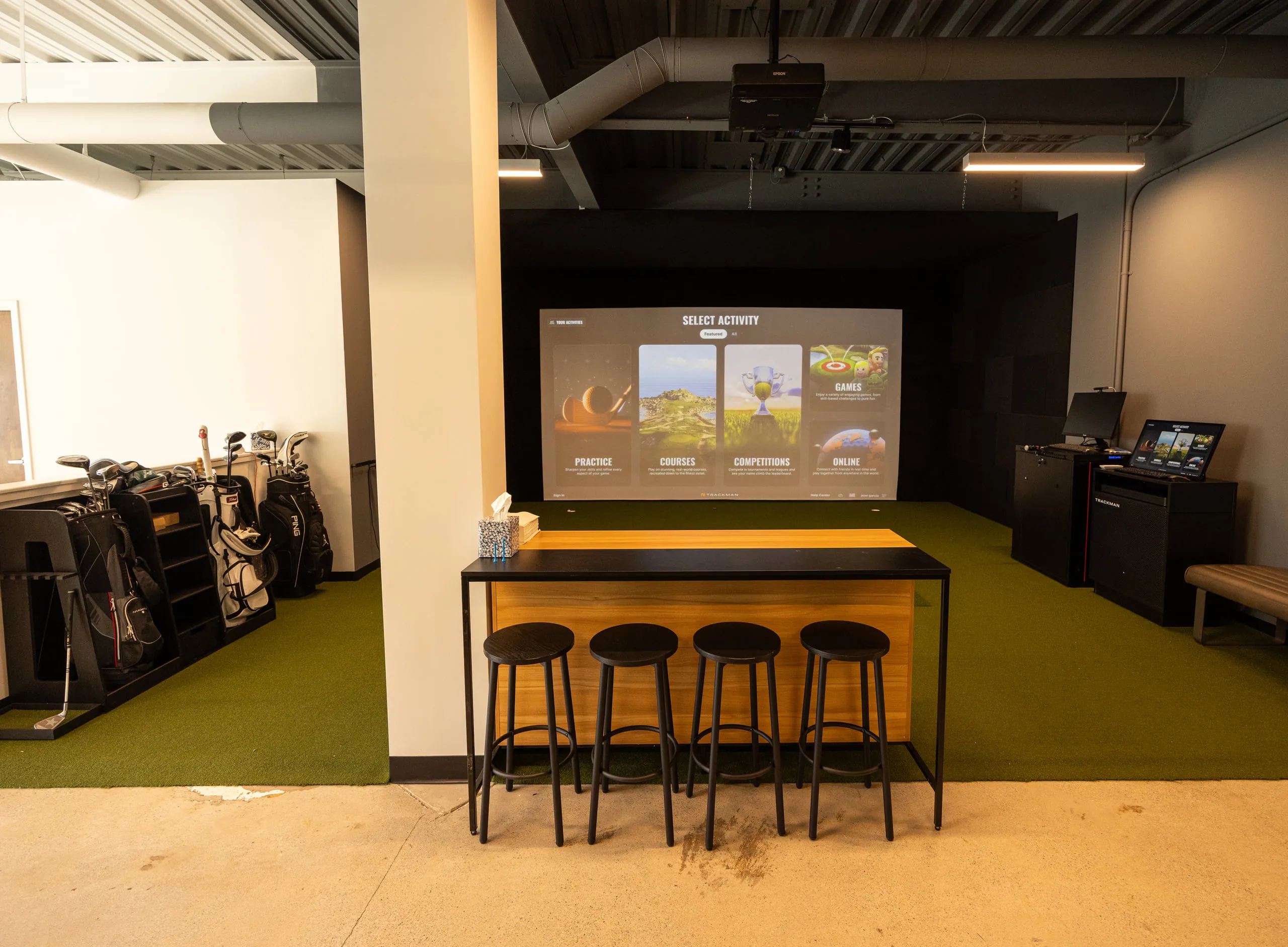 Seating and bar overlooking the simulator bay.